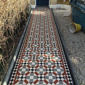 victorian outdoor tiles with original pattern leading to the house