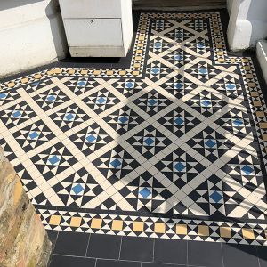 original victorian path tiles London leading from a gate to the front doors