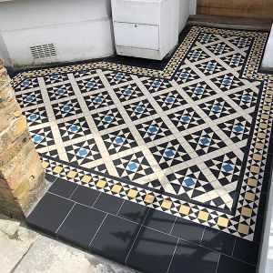 original victorian path tiles leading from a gate to the front doors