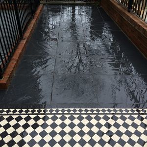 paving slabs with addition of Victorian path tiles London