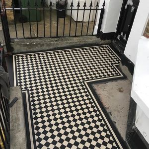 victorian black and white floor tiles London on the outside of a house