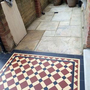 paving slabs with additon of Victorian path tiles London