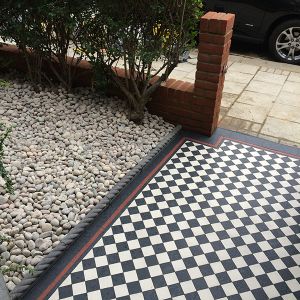 checkered victorian pathway london next to the front garden